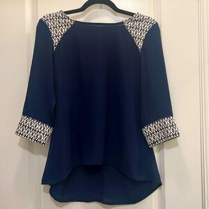 Blue top with cute shoulder/ sleeve print‎ detail